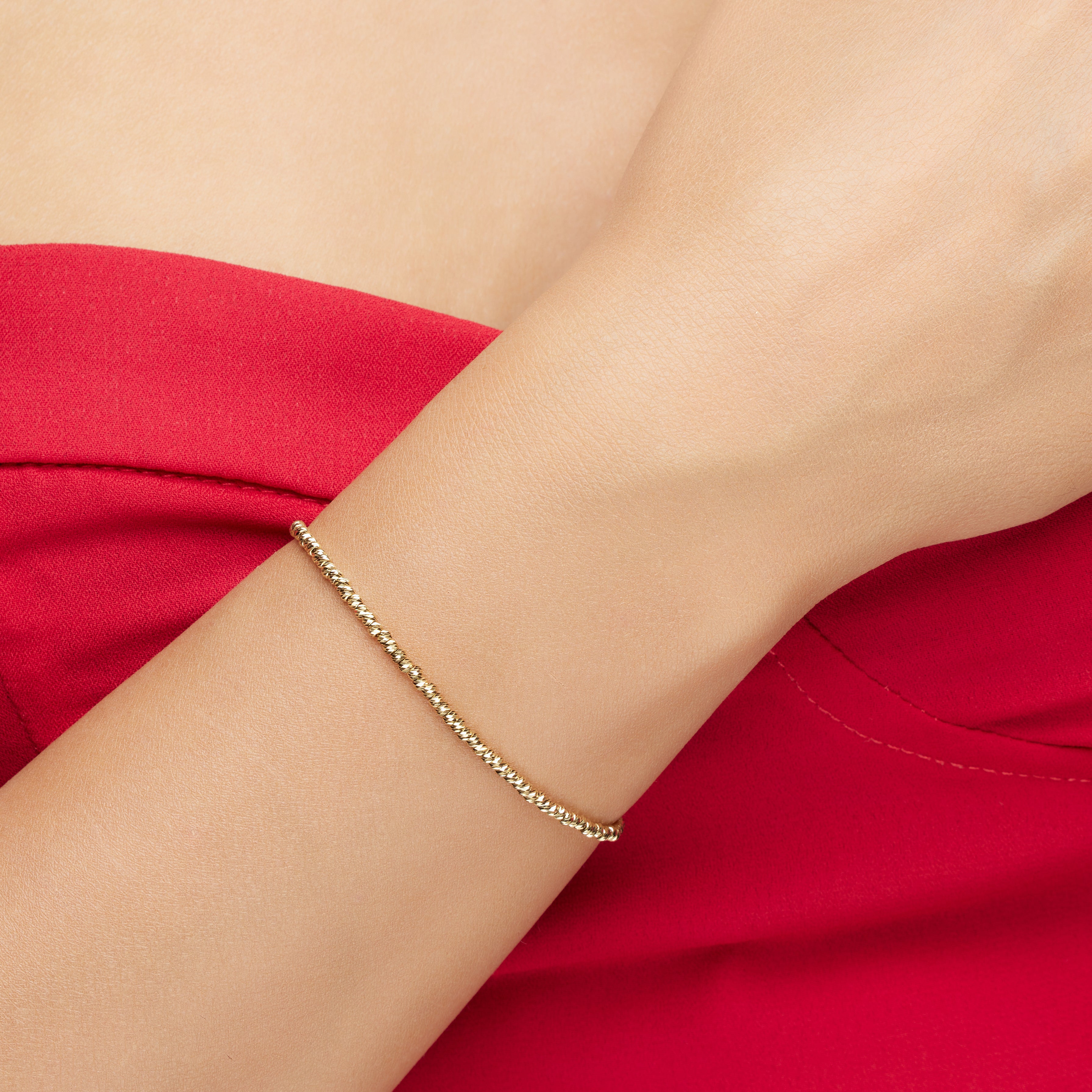 Armband aus gelbgold 14K mit facettierten perlen